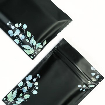 [SAMPLE] 70mm x 100mm Black with Green/Blue Flower Matt 3 Side Seal Bags