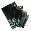 [SAMPLE] 100mm x 150mm Black with Green/Blue Flower Matt 3 Side Seal Bags