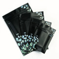 70mm x 100mm Black with Green/Blue Flower Matt 3 Side Seal Bags (100 per pack)