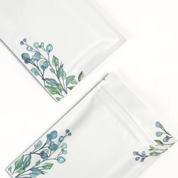 100mm x 150mm White with Green/Blue Flower Matt 3 Side Seal Bags (100 per pack)